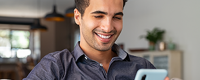 Man checking email on his smartphone.