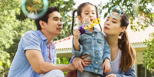 Family of three blowing bubbles