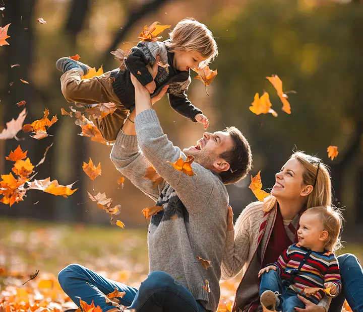 Young family enjoying fall season
