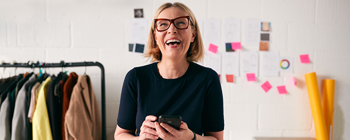 woman smiling in her office space