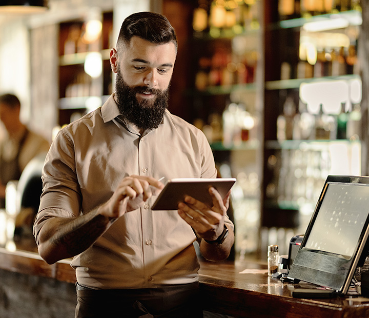 man using a tablet at work
