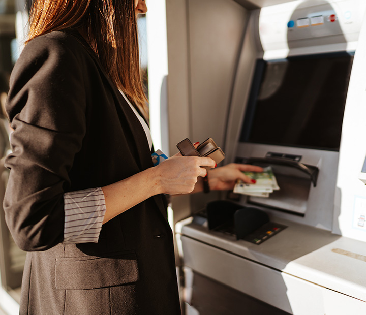 woman at an ATM