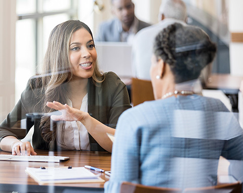 woman talking with a financial planner