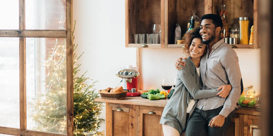 Young couple hugging and smiling